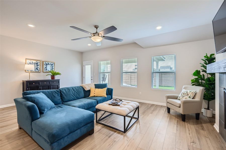 The large windows provide plenty of natural light with a lovely view of the backyard.