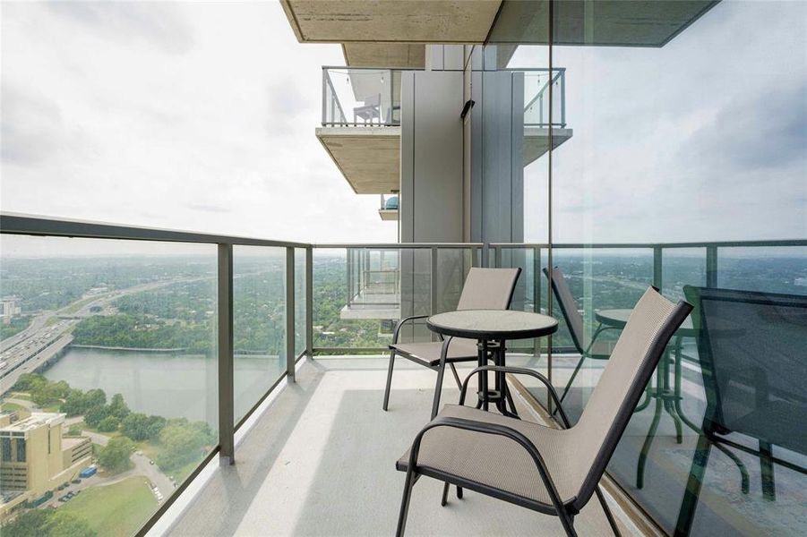 Glass deck on 38th floor overlooking Lady Bird Lake and downtown Austin
