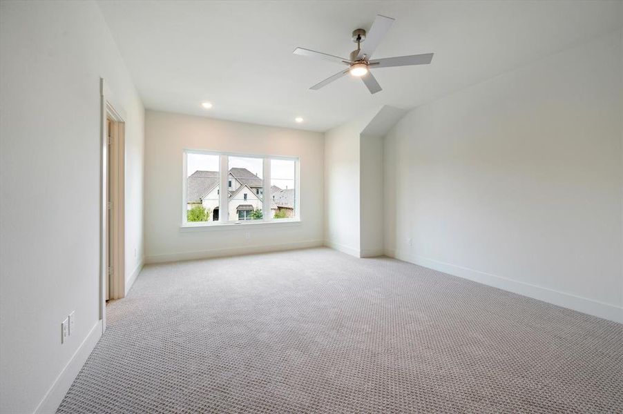 This dreamy owner's suite offers oversized windows that flood the suite with natural light.