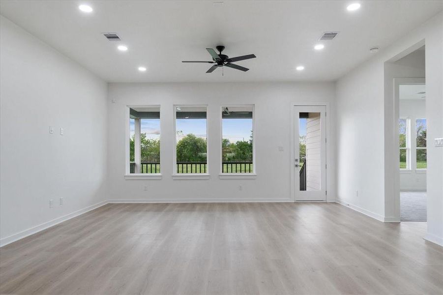 Plenty of natural light, Ceiling fan, ceiling accent lighting. Pre wired for internet, home security and smart home setup.