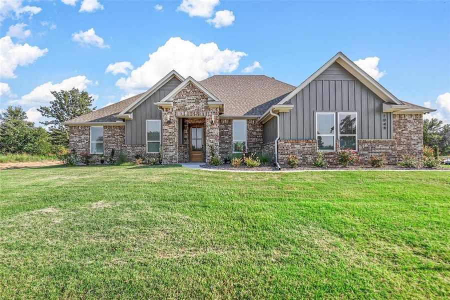 View of front of house featuring a front yard