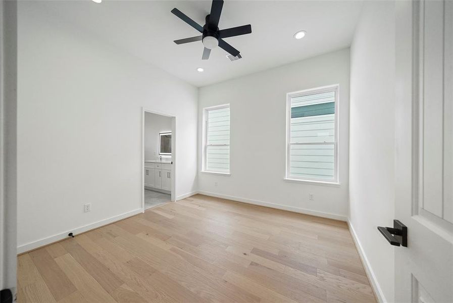 Spacious en-suite bedroom with modern finishes.