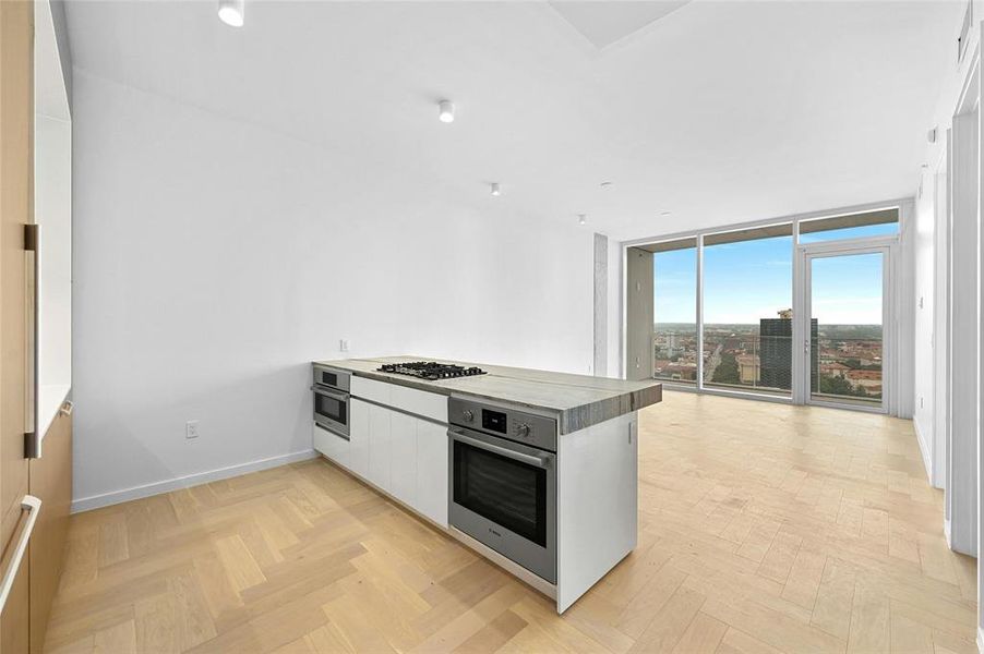 With its open floor plan, the kitchen seamlessly integrates culinary activities with captivating panoramic views, creating an immersive and inspiring cooking experience.