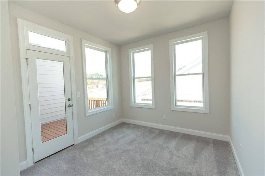 Secondary bedrooms with TONS of windows!