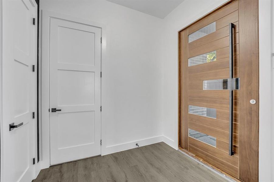 Entrance foyer featuring light wood-type flooring