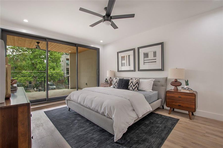 Bedroom with ceiling fan, access to outside, and light hardwood / wood-style flooring