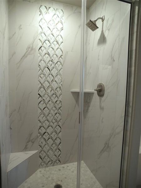 Bathroom with an enclosed shower