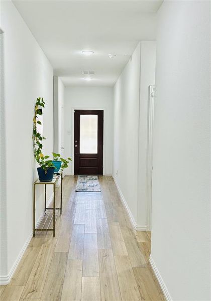 Entryway featuring light wood-type flooring