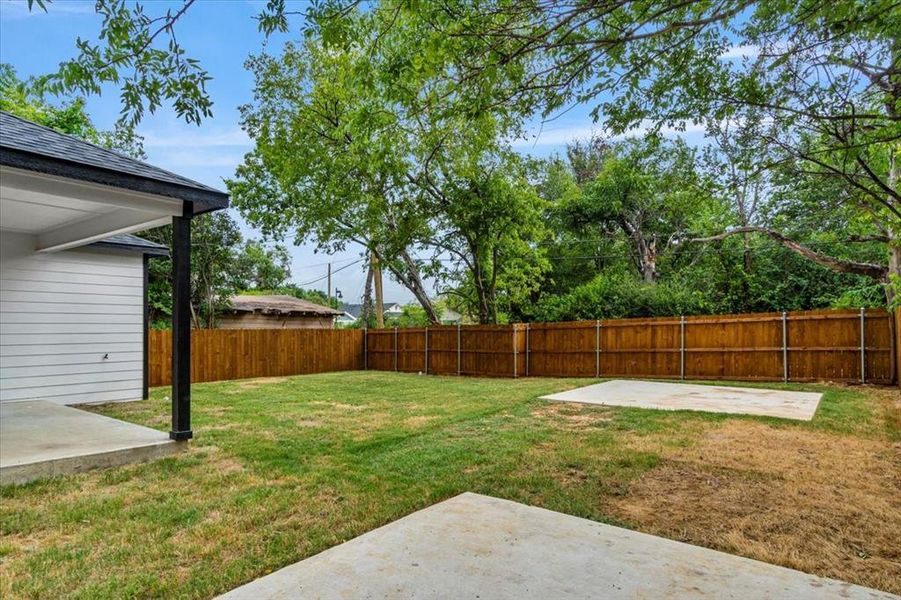 View of yard with a patio area