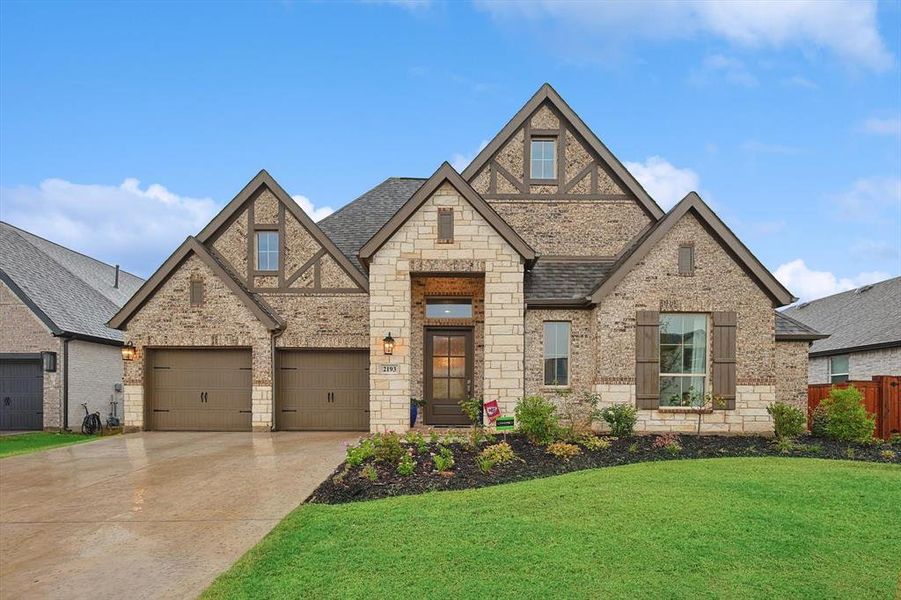 Gorgeous brick elevation, 3 car garage