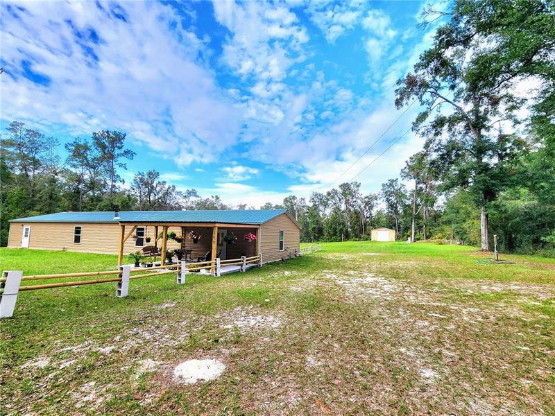 home is 30x90 all steel construction with 24x60 steel pole barn. The pole barn has a roll up door that is 12x12