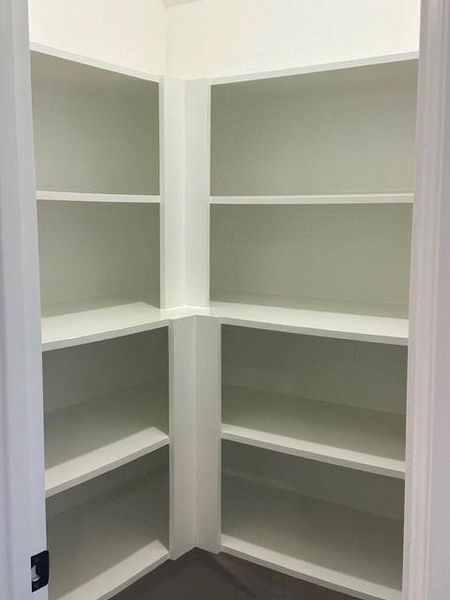 Linen closet located in the primary bathroom