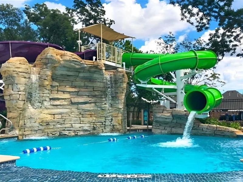 Cool off and have endless fun in the sparkling pool with a thrilling water slide, perfect for families of all ages!