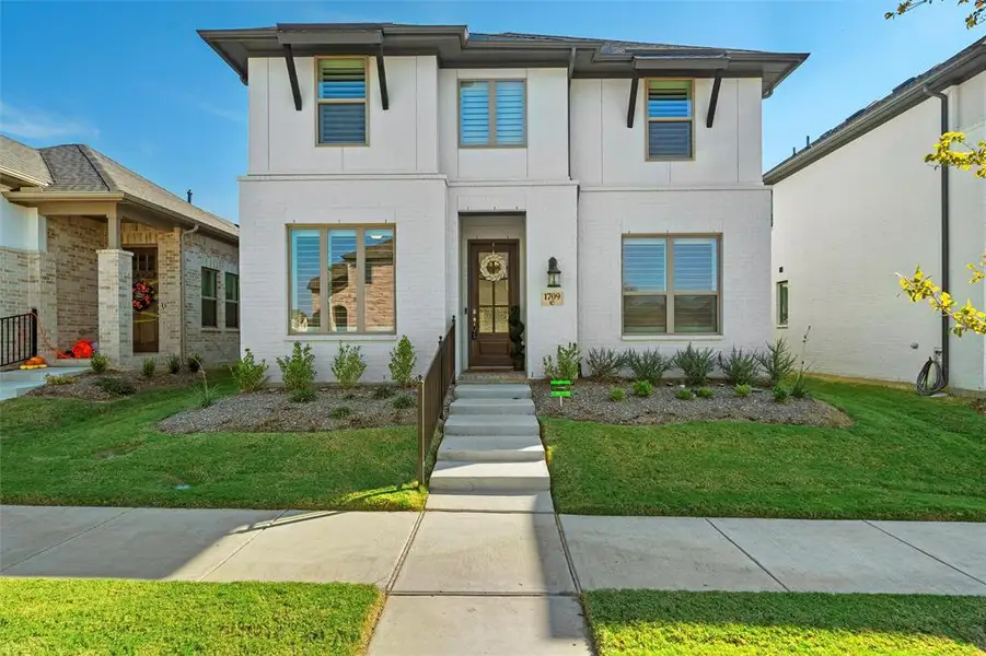 View of front of home with a front lawn