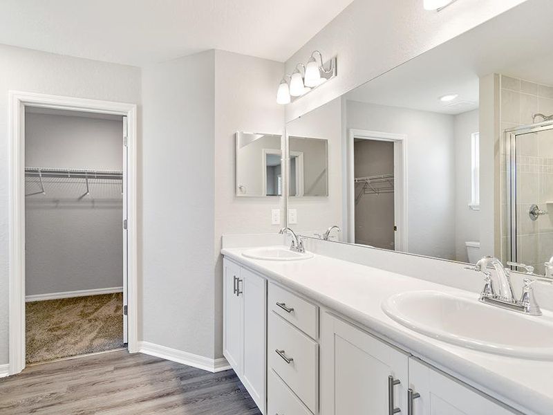 Your suite is complete with a large walk-in wardrobe and en-suite bath.