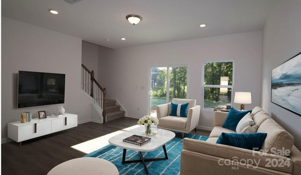 Family room shown with virtual staging