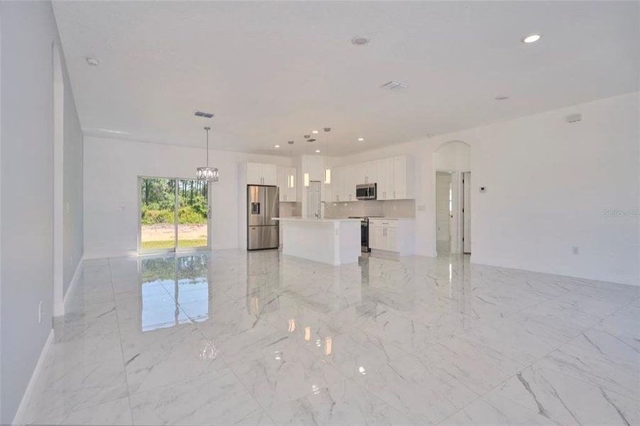 Open concept living!  Look at that beautiful porcelain tile