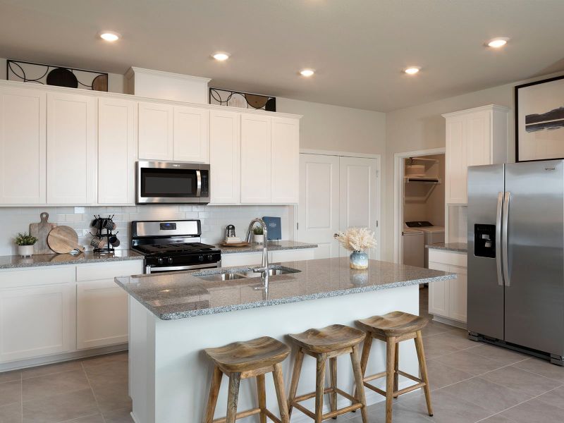 Enjoy the spacious kitchen complete with a kitchen island.