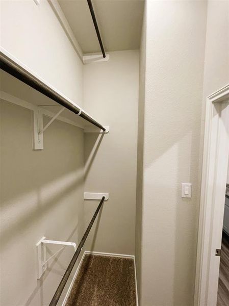 This master closet in endless- check out the 3 wardrobe racks!