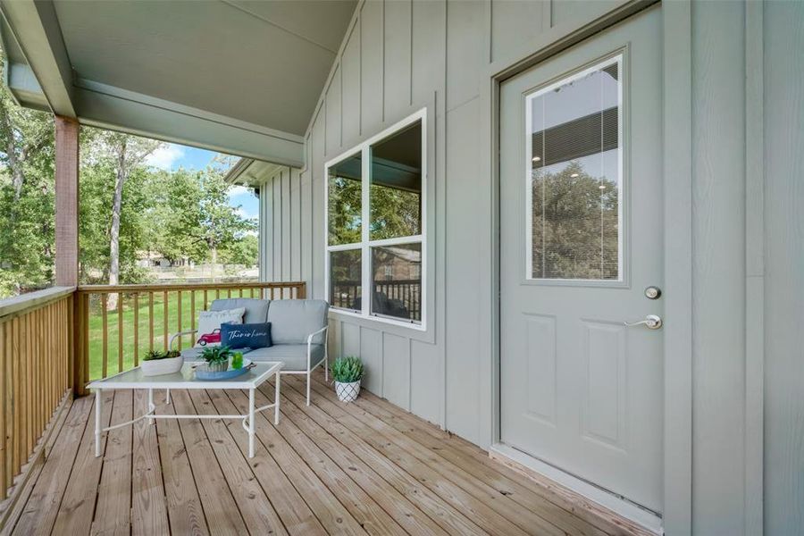 Unfurnished sunroom with lofted ceiling and a healthy amount of sunlight