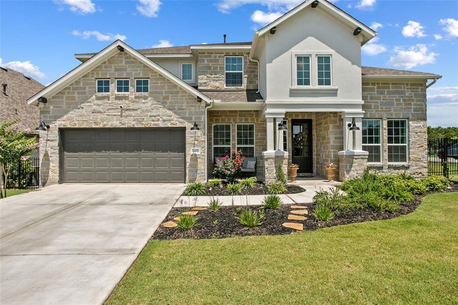 707 Two Creeks is located in Parten Ranch on a large corner lot