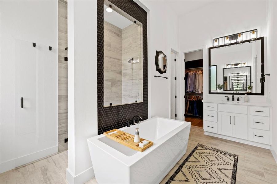 Located on the right the other separate vanity area offering plenty of space for 2 when preparing for your day.