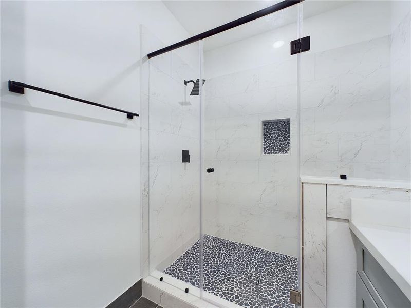 Primary bathroom with walk in shower- Model home photos
