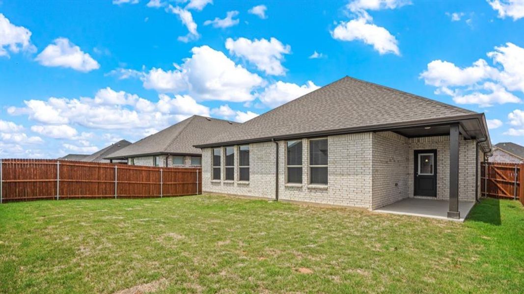 Rear Elevation - Patio - All Home and community information, including pricing, included features, terms, availability and amenities, are subject to change at any time without notice or obligation. All Drawings, pictures, photographs, video, square footages, floor plans, elevations, features, colors and sizes are approximate for illustration purposes only and will vary from the homes as built.