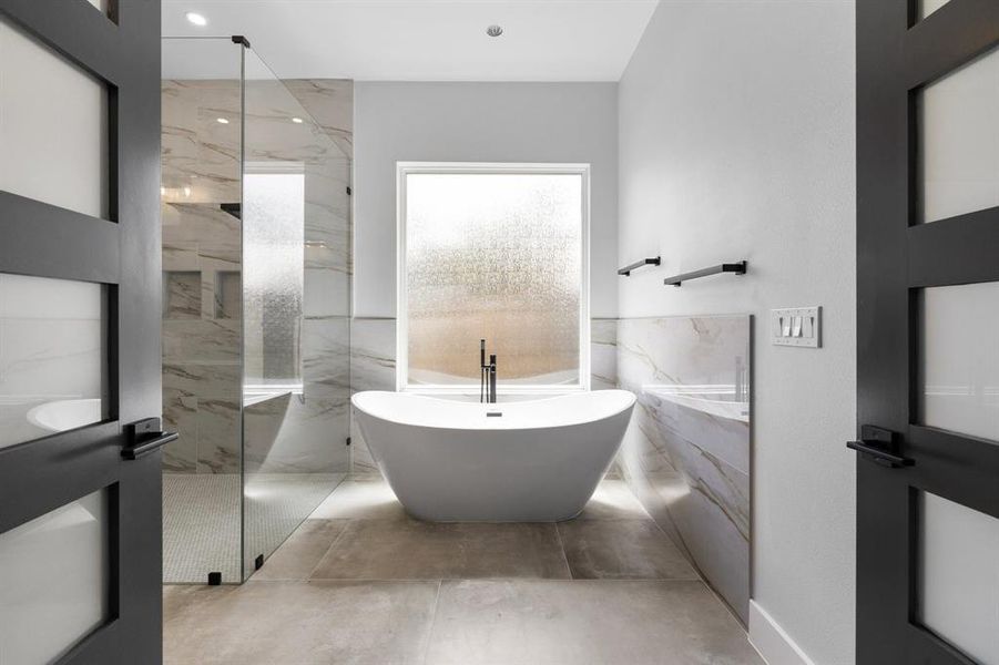 Soaking tub in the primary bathroom.