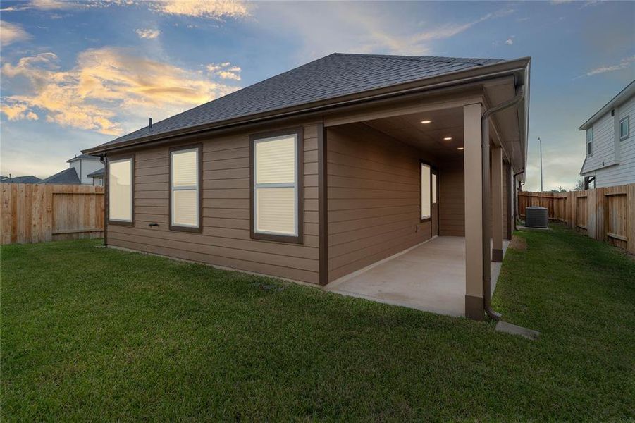 This amazing backyard with its covered rear patio provides enough space for many activities! From fun summer outdoor parties, to roasting marshmallows in the winter, this gorgeous backyard gives you the ability for many days/nights of memories!