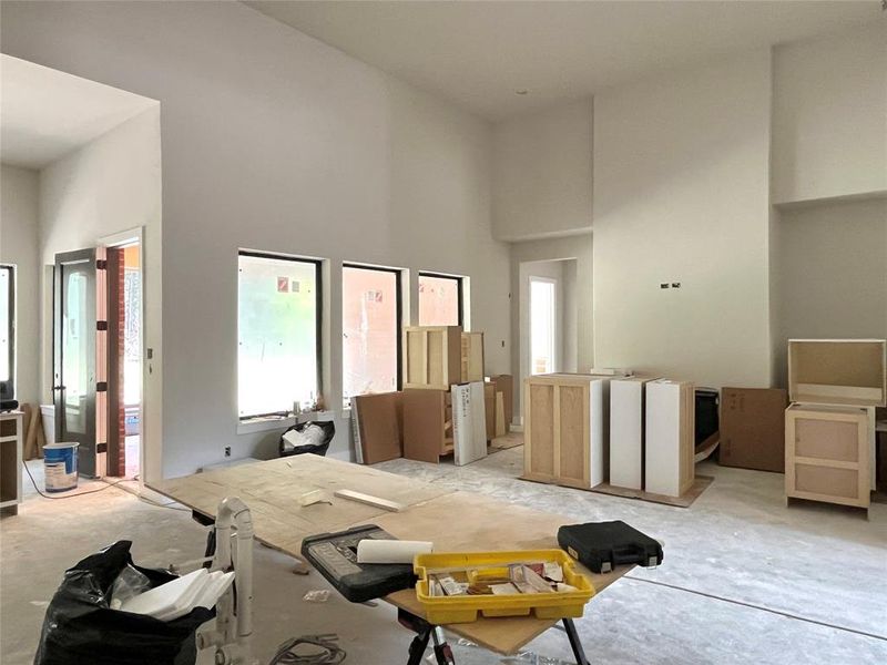 Another view from the kitchen showing the family room. The gaslog fireplace will have a cast stone surround.