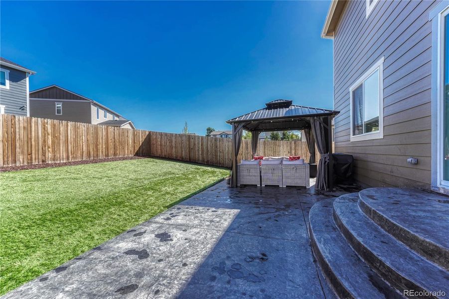 Concrete patio with pergola