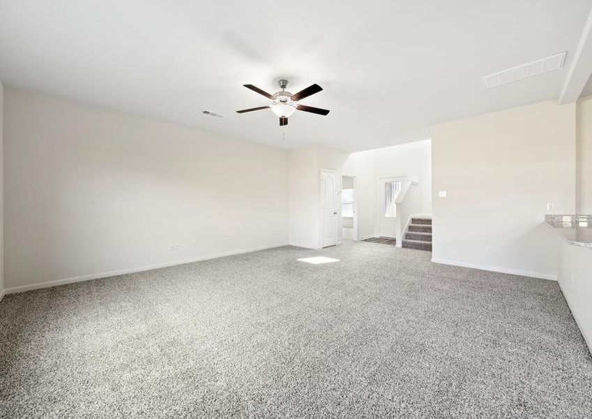 The front door of the Cypres plan leads right into the family room.