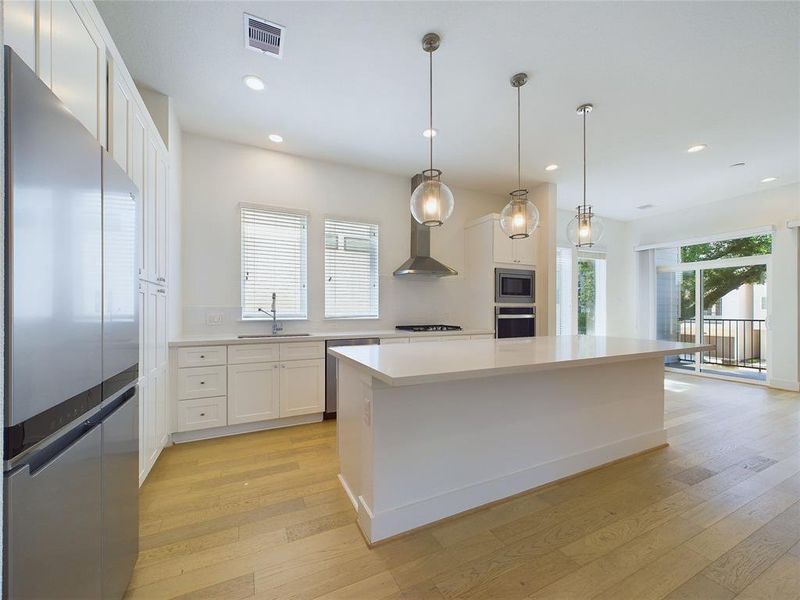 Kitchen island offers plenty of surface area for entertainment