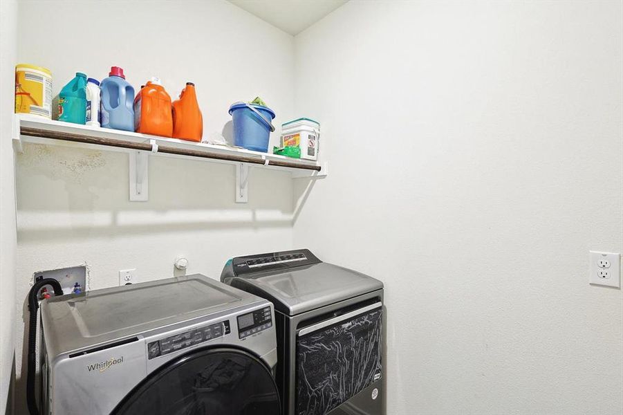 Washroom featuring separate washer and dryer