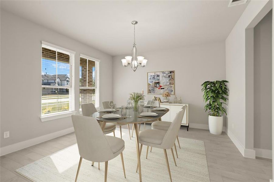 Make memories gathered around the table with your family and friends! This dining room features high ceilings, custom paint, gorgeous flooring and large windows with privacy blinds.