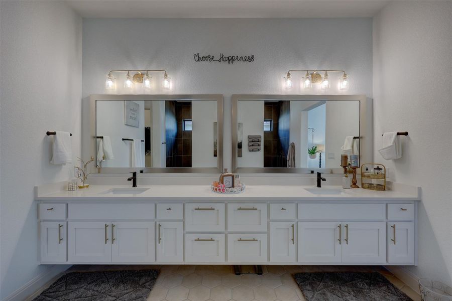 Double Sinks in Master Bath with Silestone and Floating Cabinets.