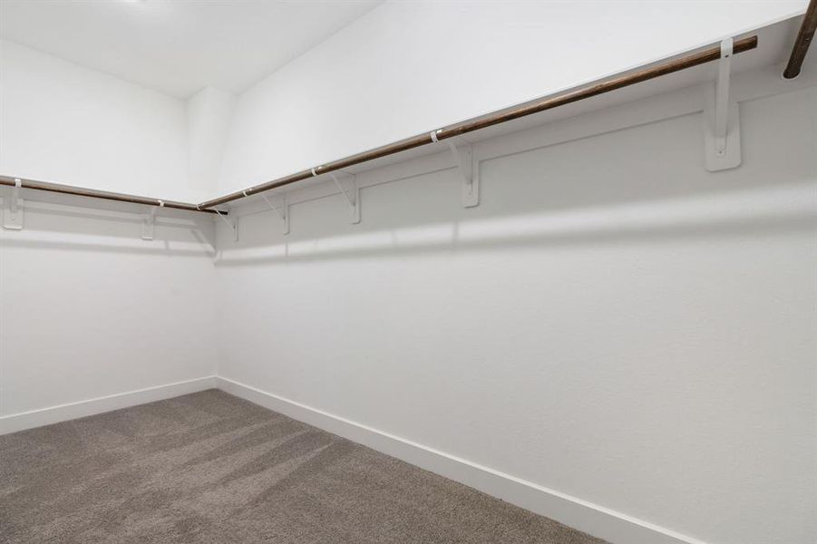 You will love the size of this Primary closet.