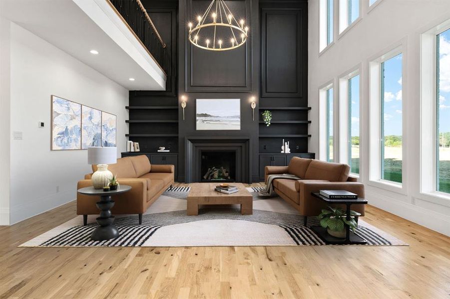 Bold and beautiful room with two-story fireplace and a breathtaking wall of windows. *Virtually staged.