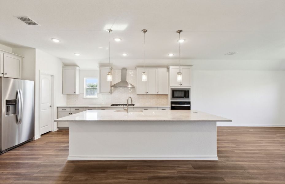 Expansive kitchen with ample cabinet space