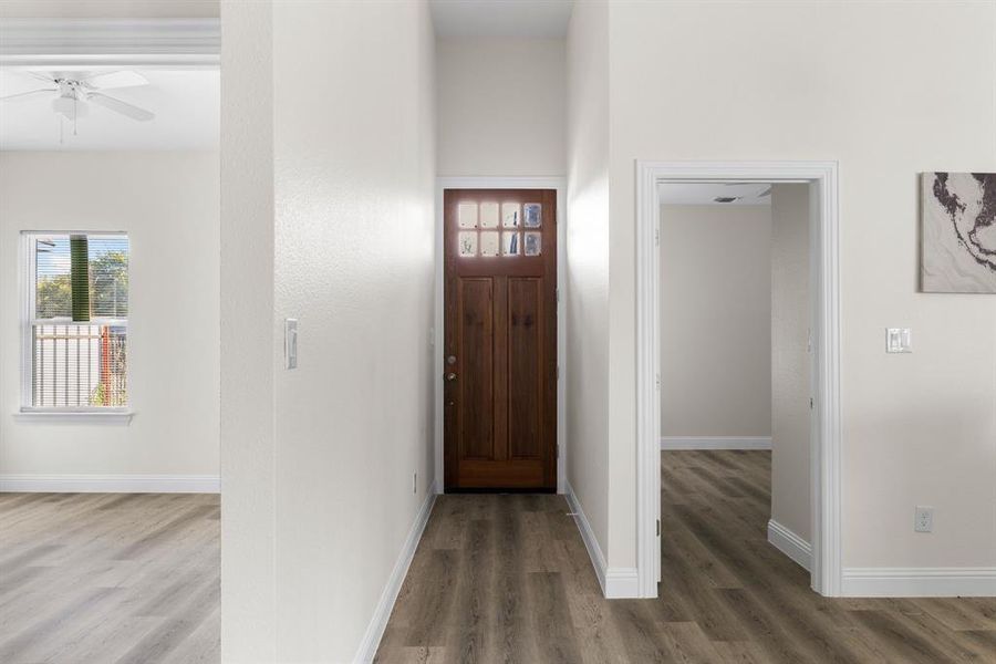 Foyer featuring ceiling fan and hardwood / wood-style flooring