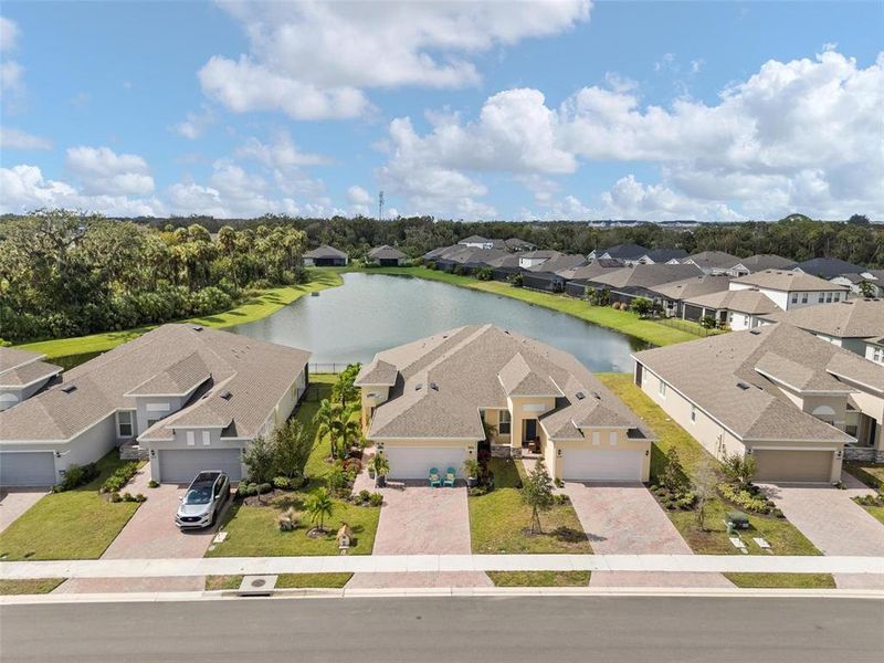 This wonderful neighborhood is designed for privacy, featuring stunning water views. Enjoy evening strolls or golf cart rides along the sidewalk, making it easy to access various nearby attractions."