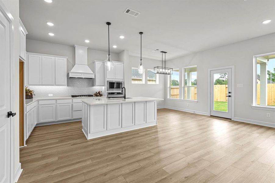 EXAMPLE PHOTO: Imagine entertaining family and friends in this Kitchen!