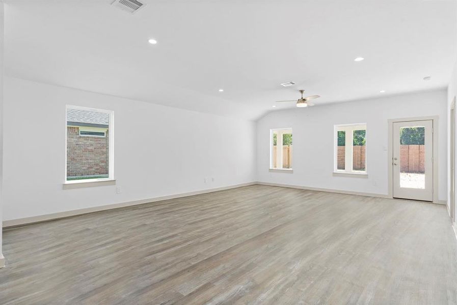 Wow factor with the High Ceilings and wall of windows for all that natural lighting! **Image Representative of Plan Only and May Vary as Built**