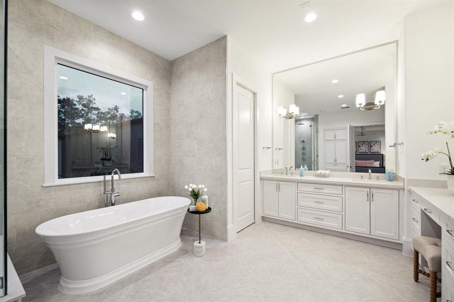 Another view of the Primary Bathroom, which also features a separate commode area.