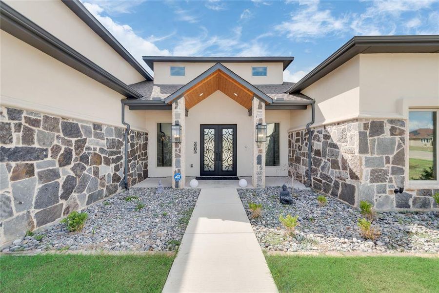 Property entrance with french doors