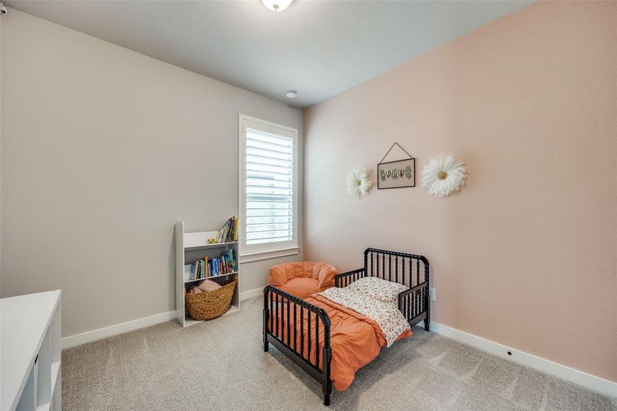 Bedroom with carpet flooring