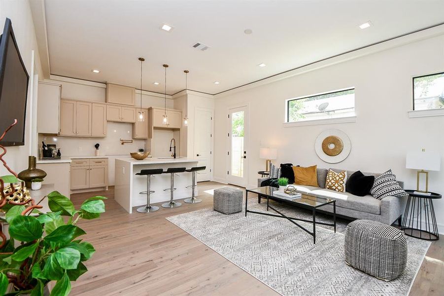 Look at how it all comes together. From flooring to cabinets to hidden linear lighting along the ceiling to the pot -filler in the solid quartz backsplash the features you will find in these home rivals Million$+ homes. This home displays finish package 1