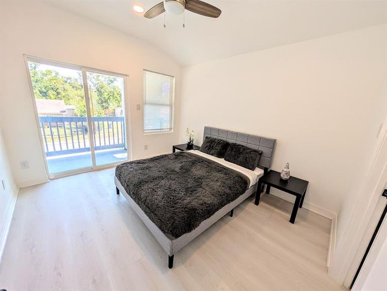 Secondary bedroom with a balcony.