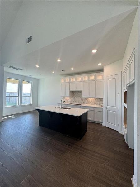 HOME IN PROGRESS - Stunning modern kitchen with upgraded stacked upper cabinets and under cabinet lighting!